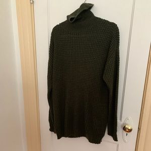 Green turtleneck sweater
